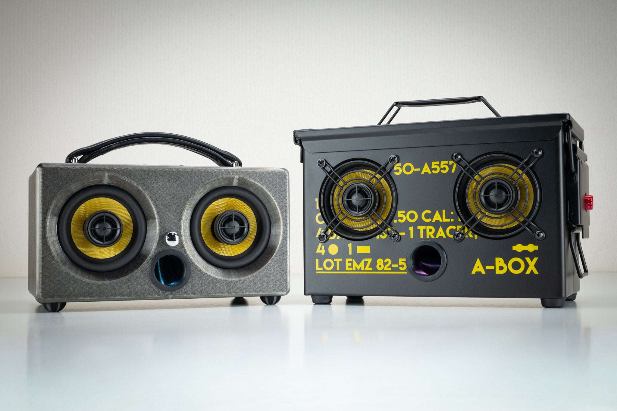 Grey Thodio iBox Mini 3D-printed Bluetooth speaker beside the .50 cal ammo can A-BOX speaker for comparison